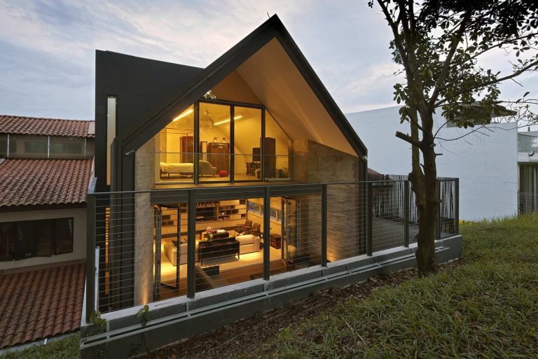 gabled roof jazzes up minimalist y house singapore 1 backview